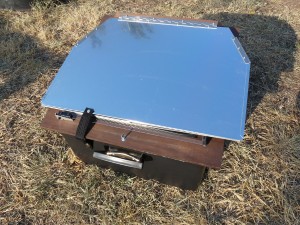 Solar oven folded down for storage.  Very portable.